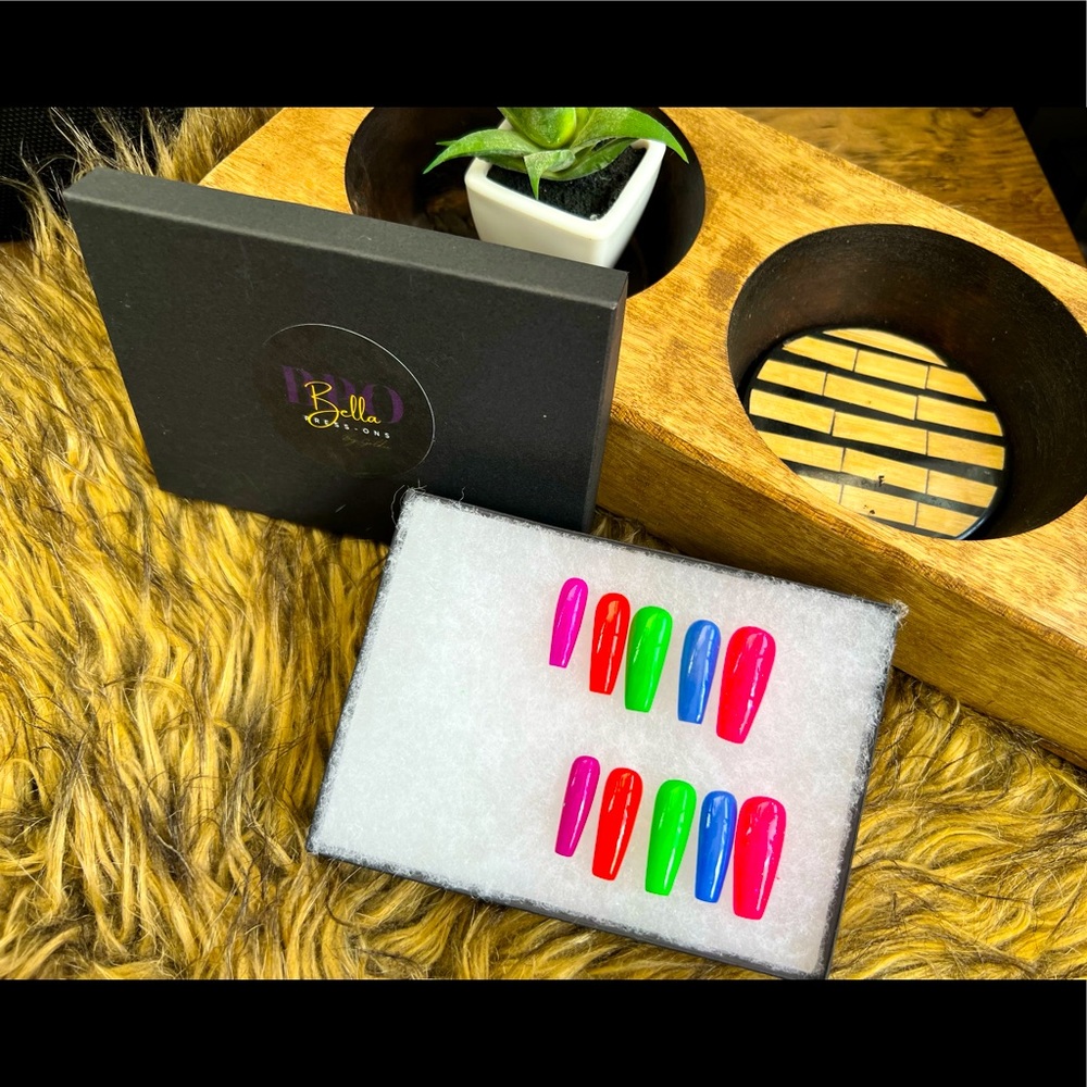 Press on nails. Rainbow 🌈 colors made for a fun person. 🥰